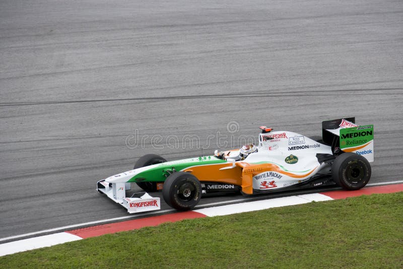 F1 Rennend 2009 - Adrian Sutil (Kracht India) stock afbeelding F1 Rennend 2009 - Adrian Sutil (Kracht India) stock afbeelding