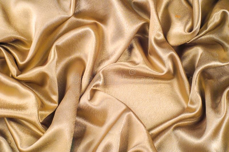 Gold thread on the fabric texture Stock Photo