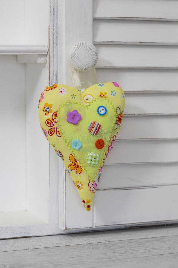 Fabric patchwork heart hanging royalty free stock images