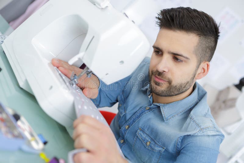 Fabric and sewing machine stock photo. Image of fabric 210147496