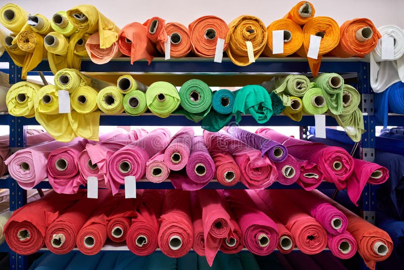 Fabric Warehouse with Many Multicolored Textile Rolls Stock Image