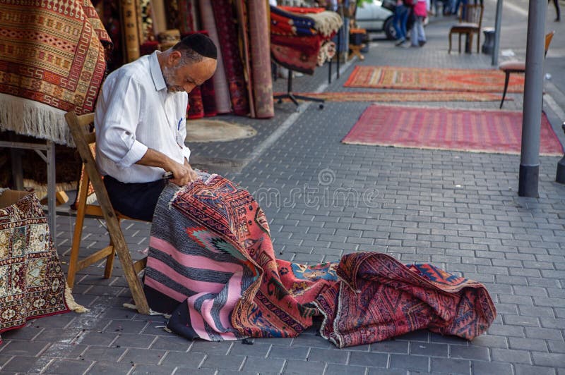 This is a picture of a Jewish carpet maker, Old City Jaffa, Tel Aviv, Israel.nnPhotograph Taken on December 2, 2007. This is a picture of a Jewish carpet maker, Old City Jaffa, Tel Aviv, Israel.nnPhotograph Taken on December 2, 2007