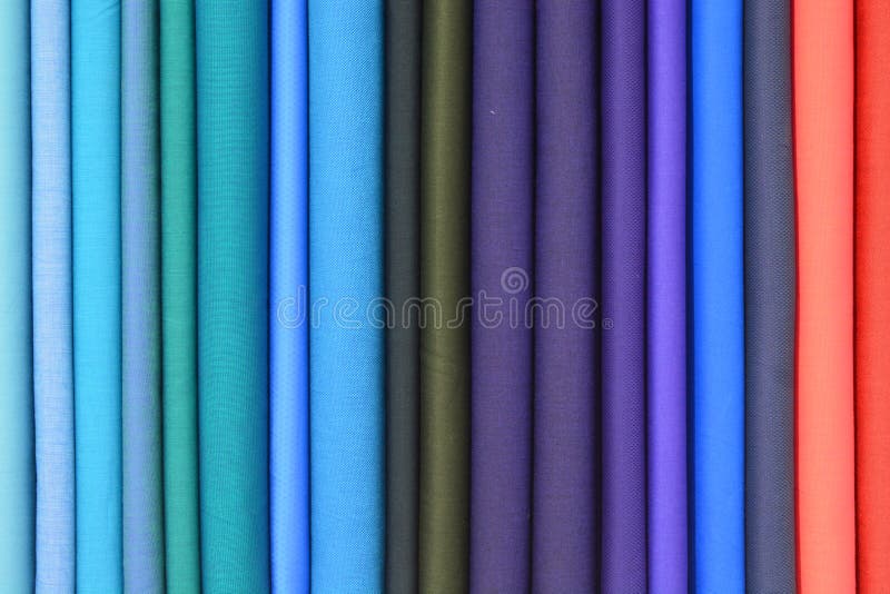 Colorful Fabric Rolls on Textile Market, Fabric Background Stock Photo