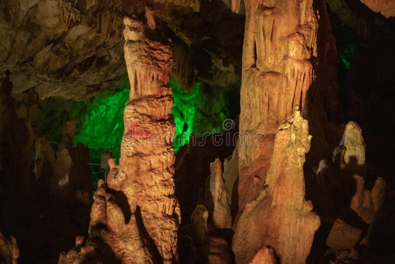 Fabulous abstract background of stalactites, stalagmites and stalagnates in a cave underground, horizontal stock photos