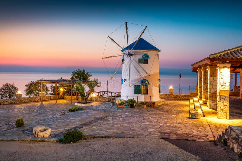 Fabulous morning scene on the Potamitis Windmill. Colorful spring sunrise on the Zakynthos island, Ionian Sea, Greece, Europe.