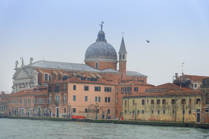 Facade of Basilica di San Giovanni, Venice, Italy. Facade of Basilica di San Giovanni along canal waterfront in Venice, Italy against winter blue skies with copy royalty free stock photos Facade of Basilica di San Giovanni, Venice, Italy. Facade of Basilica di San Giovanni along canal waterfront in Venice, Italy against winter blue skies with copy royalty free stock photos