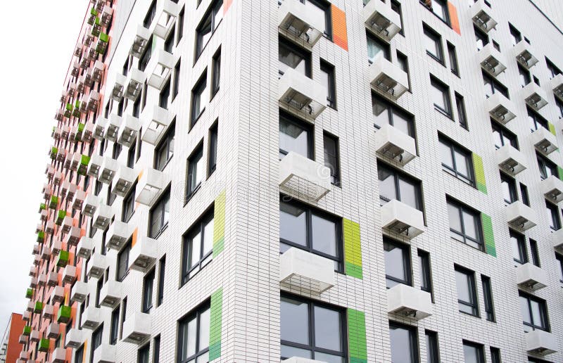 facade of a modern apartment building, windows and air conditioning