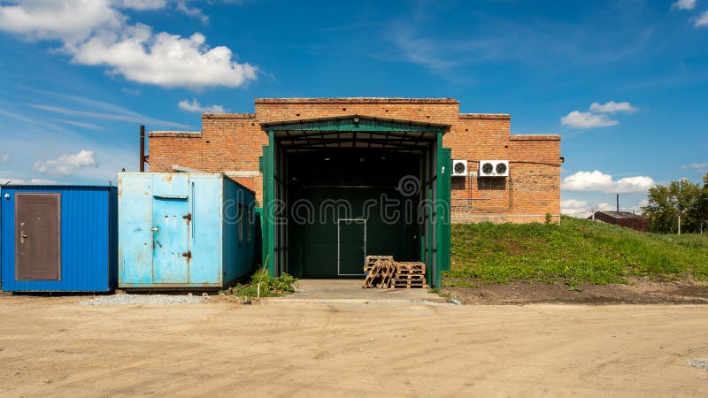 Facade of a metal and brick warehous