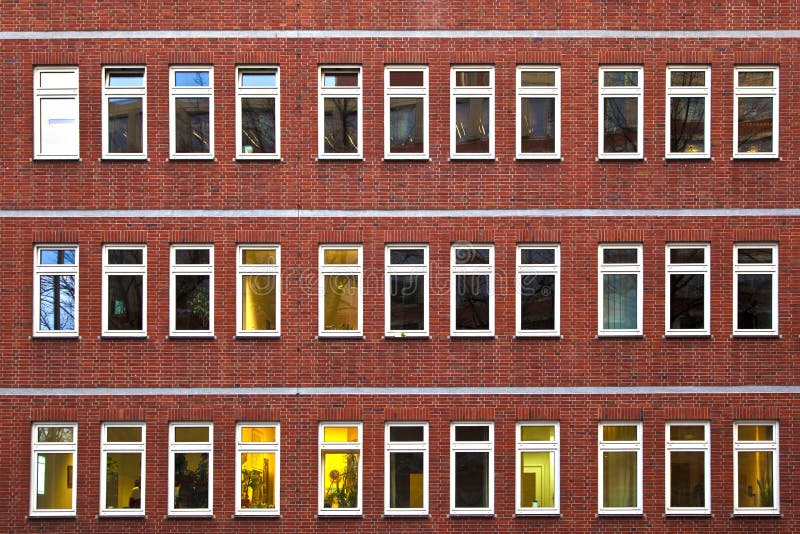 Facade of office building by night