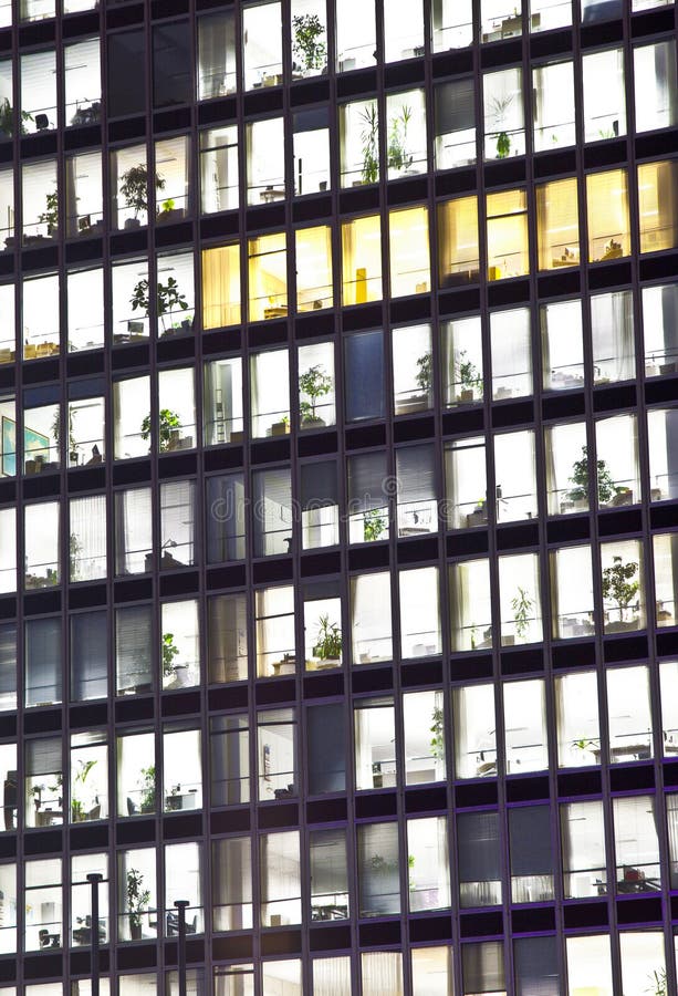 Facade of office building by night