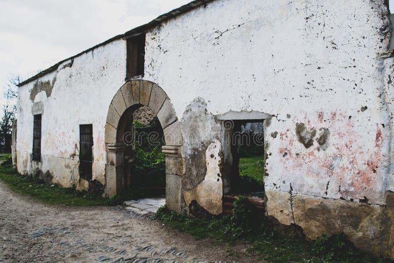 Facade of old hospital abandoned in the village stock image Facade of old hospital abandoned in the village stock image