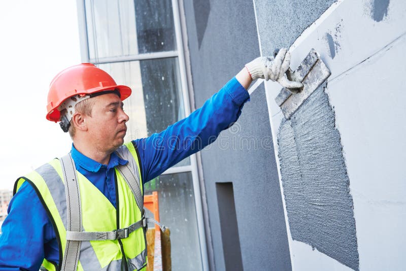 Facade Worker Plastering External Wall of Building Stock Photo Image