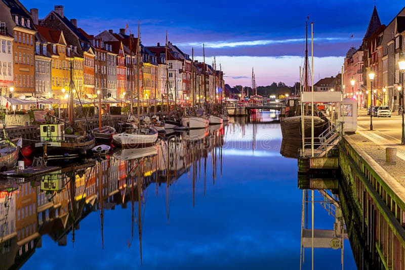 Copenhagen. Nyhavn Canal, colorful houses and city embankment at sunrise. stock images Copenhagen. Nyhavn Canal, colorful houses and city embankment at sunrise. stock images