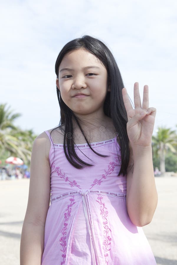 Face Of Asian Girl Show Finger Acting As A Symbolic Of Number Stock Image Image 28490607