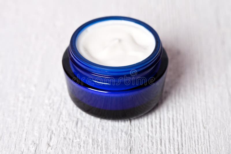 Face cream in blue jar