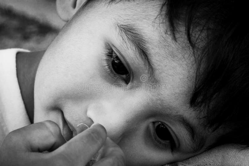 Face cute little boy sad ,black and white tone stock photo