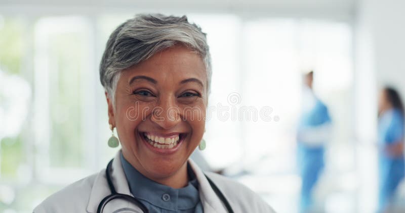 Face, doctor and woman laughing in hospital ready for tasks, goals or targets. Leadership, senior or portrait of comic