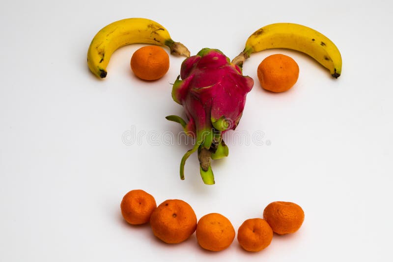 Face from fruits on white background. face made with fresh fruits. banana, mandarin tangerine stock photos Face from fruits on white background. face made with fresh fruits. banana, mandarin tangerine stock photos