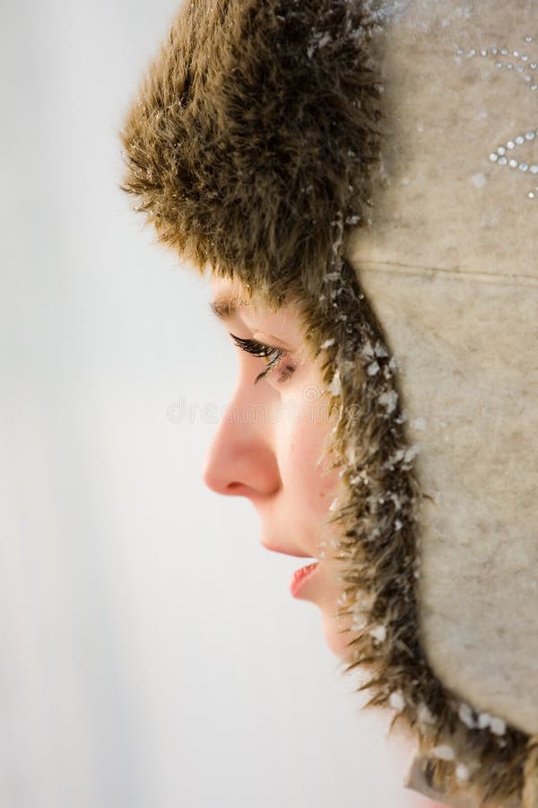 Face girl In warmly hat stock image