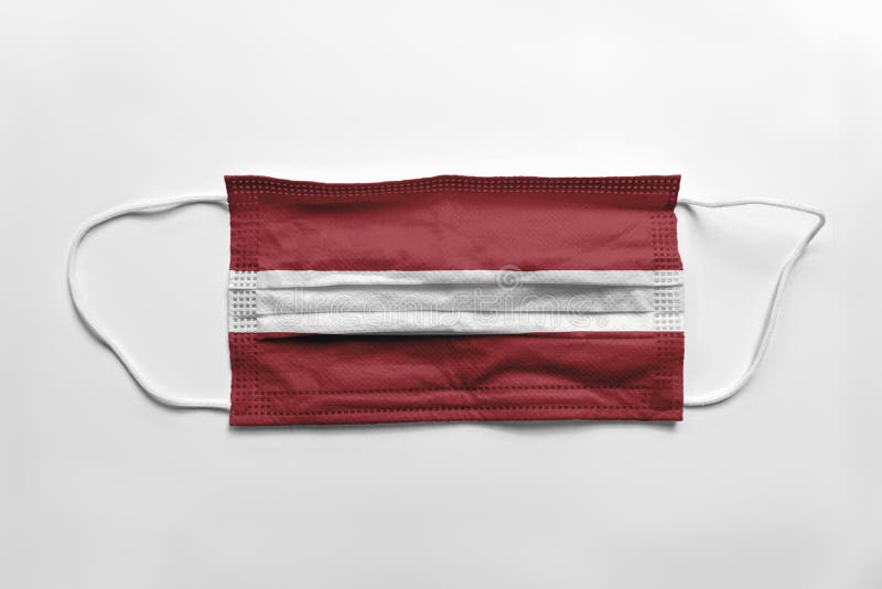 Face mask with Latvia flag printed, on white background, isolated stock illustration