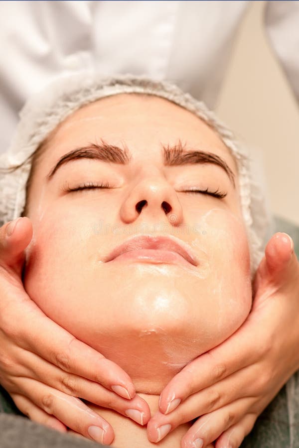 Face Massage Beautiful Caucasian Young White Woman Having A Facial Massage With Closed Eyes In