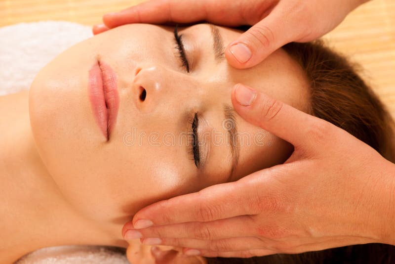 Face Massage Close Up Of A Young Woman Getting Spa Treatment Stock