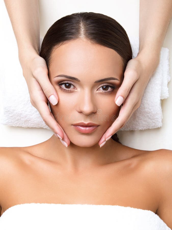 Face Massage Close Up Of A Young Woman Getting Spa Treatment Stock