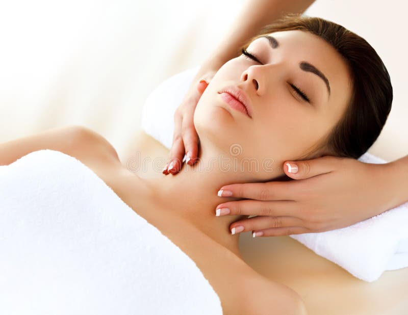 Face Massage Close Up Of A Young Woman Getting Spa Treatment Stock