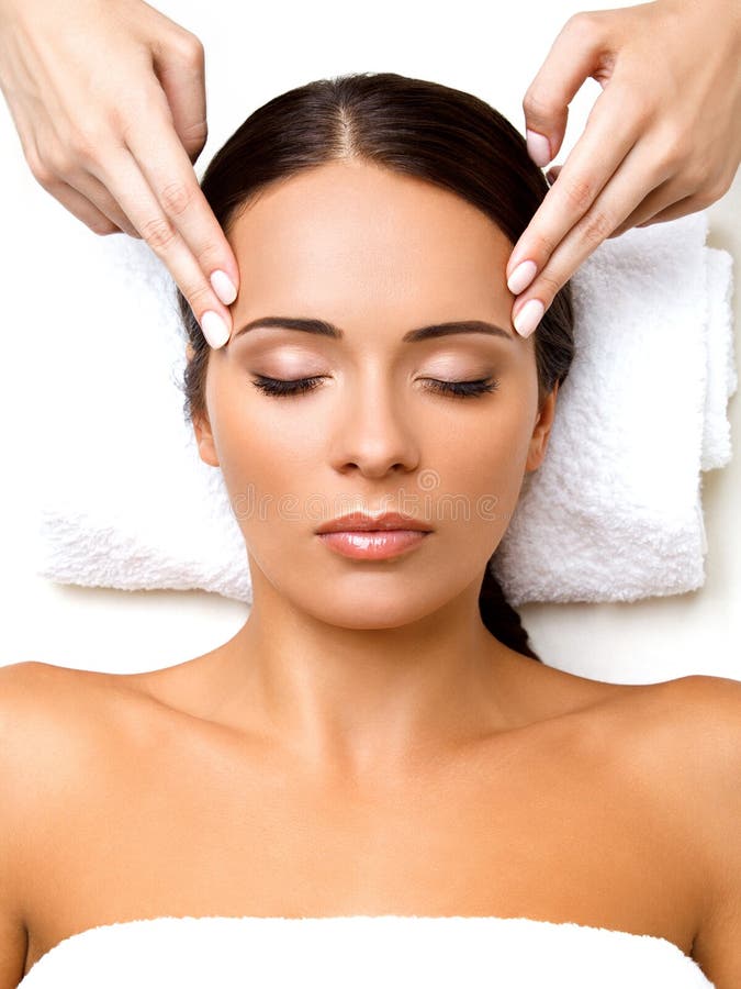 Face Massage Close Up Of A Young Woman Getting Spa Treatment Stock