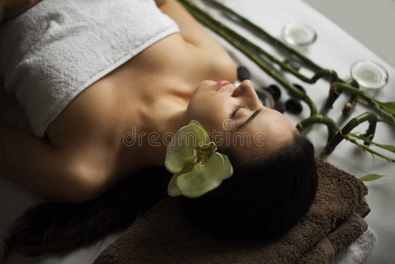 Face Massage. Close-up of a Young Woman Getting Spa Treatment. stock photo Face Massage. Close-up of a Young Woman Getting Spa Treatment. stock photo