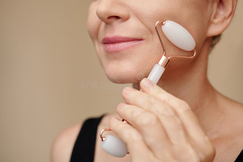 Face Massage with Roller stock image. Image of collagen 274000883