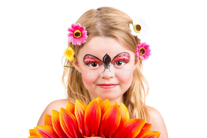 Beautiful young girl with face painted like a ladybug. Beautiful young girl with face painted like a ladybug