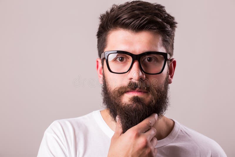 Face Portrait Of Bearded Man In Glasses With Hand On Beard Stock Image Image Of Freshness