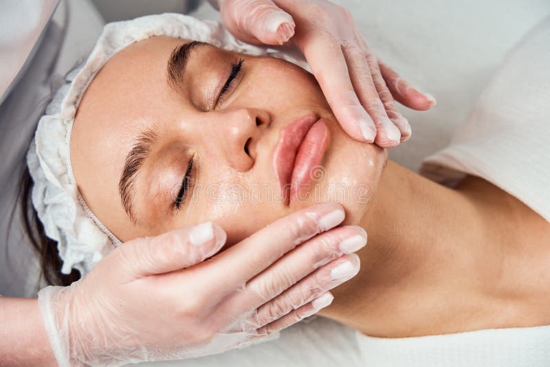 Face Skin Care. Close-up Of Woman Getting Facial Hydro Microdermabrasion Peeling Treatment At Cosmetic Beauty Spa Clinic