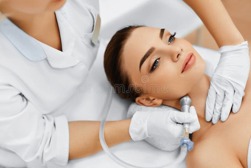 Face Skin Care. Diamond Microdermabrasion Peeling Treatment, Beauty Spa. Cosmetology. stock image Face Skin Care. Diamond Microdermabrasion Peeling Treatment, Beauty Spa. Cosmetology. stock image