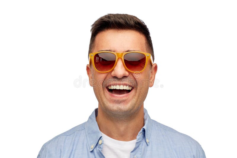 Face of smiling man in shirt and sunglasses