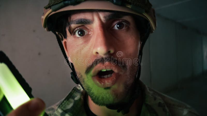 Face Of A Worried Soldier Trying To Communicate With His Team stock video footage