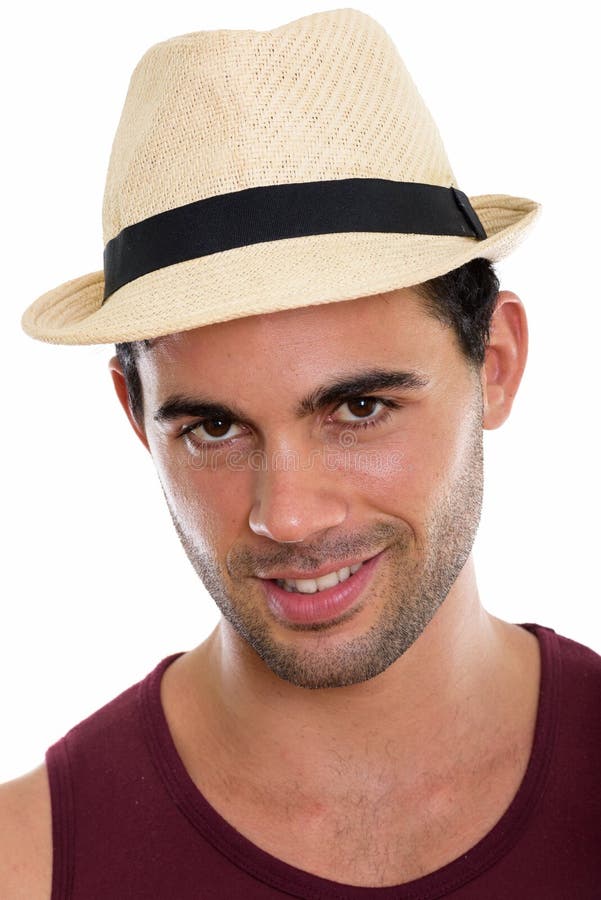 Face of Young Happy Hispanic Man Smiling while Wearing Hat Stock Photo ...