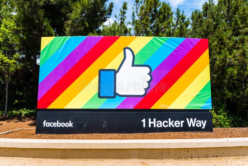 Facebook mögen Knopf auf einem Regenbogenflaggenhintergrund lizenzfreies stockfoto Facebook mögen Knopf auf einem Regenbogenflaggenhintergrund lizenzfreies stockfoto