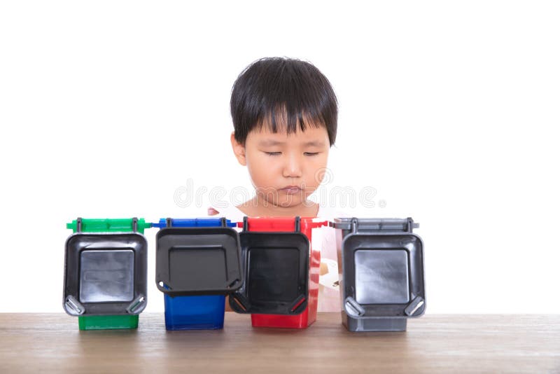 Faced with Four Different Sorting Trash Bin Models, Children are