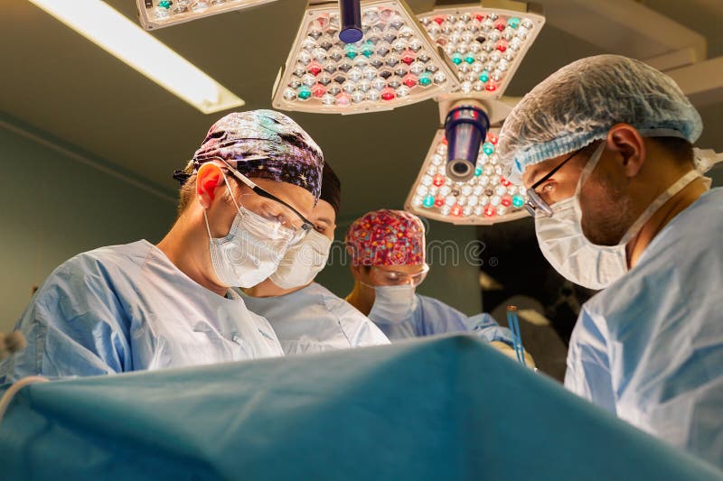 The Faces of Doctors Surgeons in Masks are a Big Plan, an Operating
