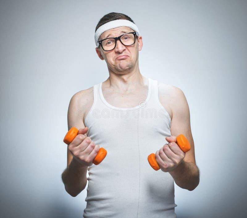 Facial Expression Nerd With Dumbbells Stock Image - Image of studio ...