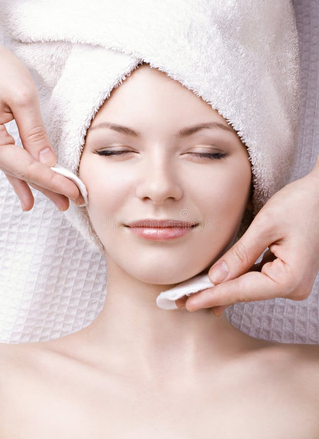 Beautiful woman enjoying facial massage