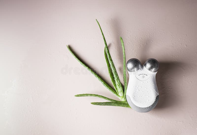 Facial Massager with Microcurrent Attachment. Using Electrical Impulses