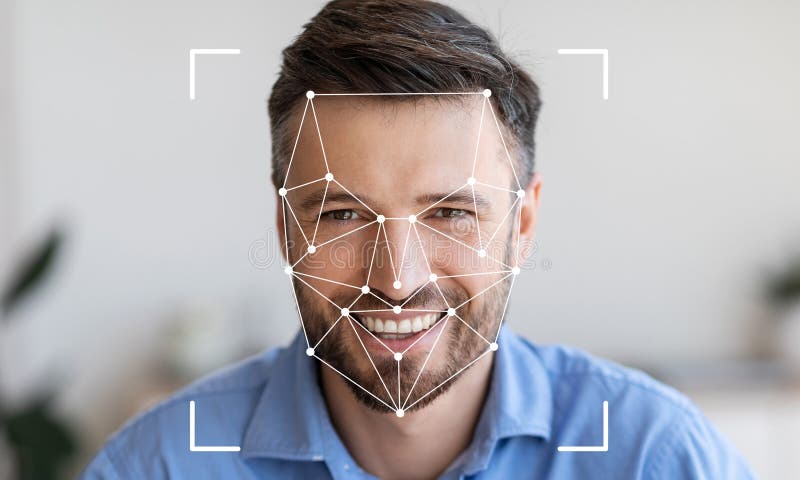 Facial recognition technology analyzing a man's face with a neutral background stock photo