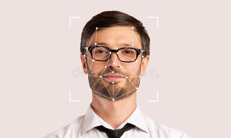 Facial recognition technology being demonstrated by a man stock image