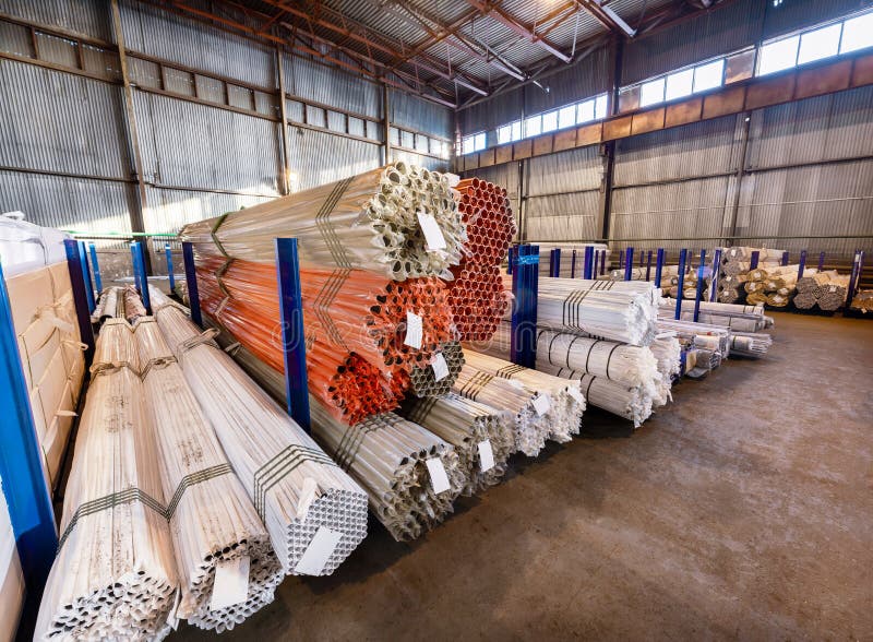 Factory warehouse metal rolled. Bundles of steel pipes stacked royalty free stock photos Factory warehouse metal rolled. Bundles of steel pipes stacked royalty free stock photos