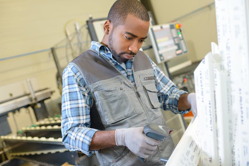 Factory Worker Using Scanner Stock Photo Image of stacking, storeroom
