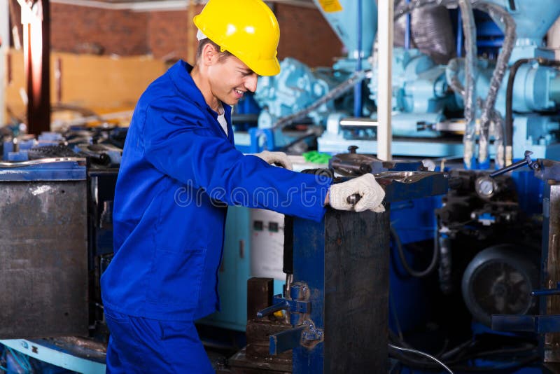 Experienced factory worker working in gum boot factory