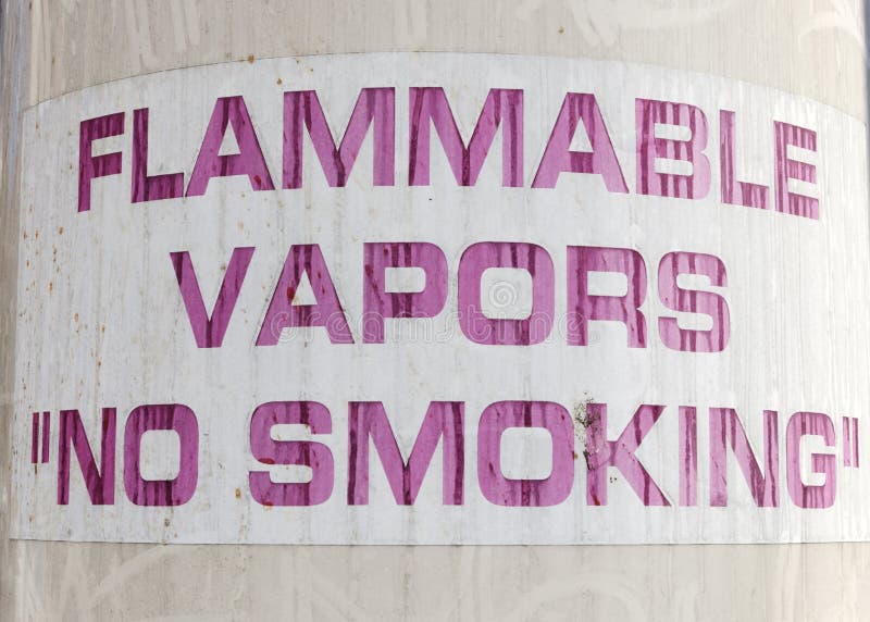 FLAMMABLE VAPORS NO SMOKING Sign. Stock Photo Image of placard, sign